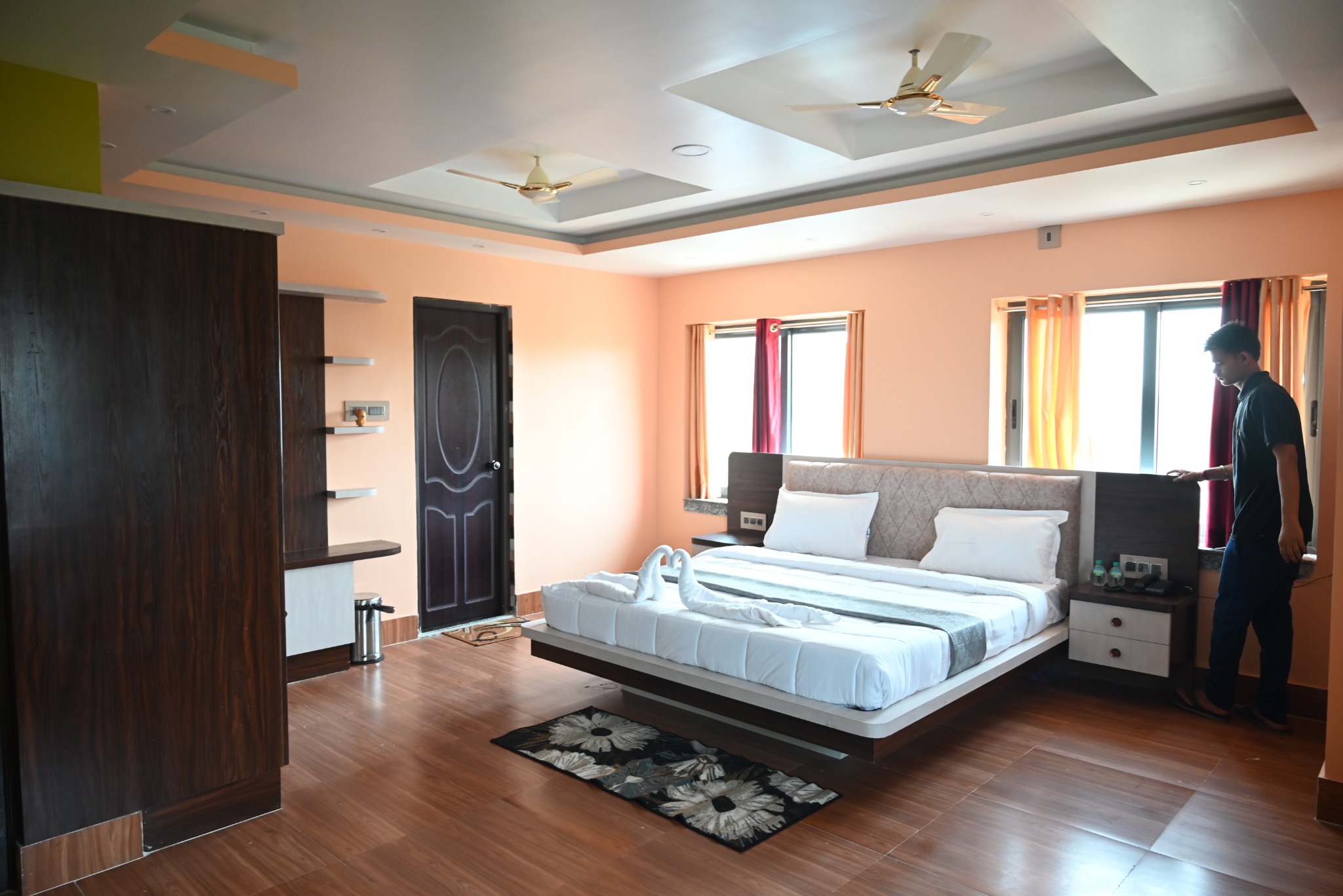 Comfortable guest room at Hotel Tulusi Inn